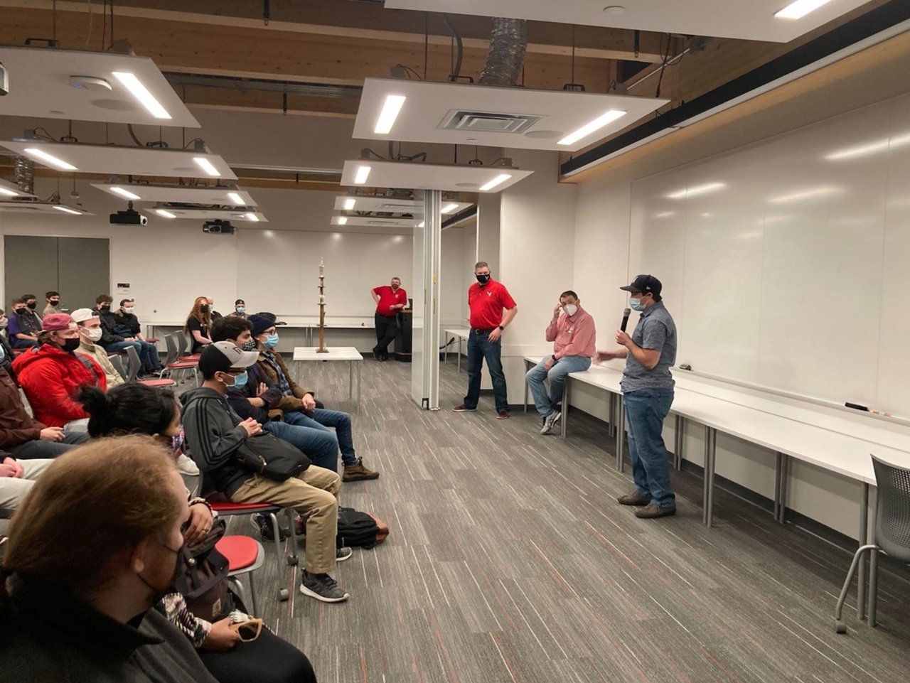 Security Engineers and Developers from Security Innovation discussing cybersecurity with students at the Spokane Mayor's Cup CTF Cybersecurity Competition at Eastern Washington University.